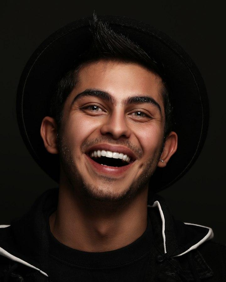 A young man laughing